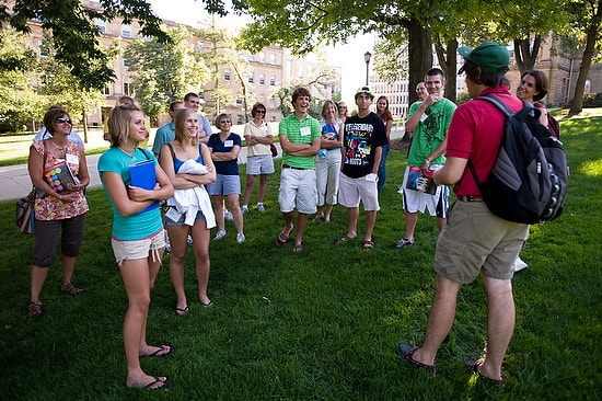 A New Student Leader tour guide leads incoming first-year undergraduates and their parents across Bascom Hill while on a campus tour during a Student Orientation, Advising and Registration (SOAR) session at the University of Wisconsin-Madison on July 22, 2008. Sponsored by Orientation and New Student Programs, the two-day SOAR sessions provide new students and their parents an opportunity to meet with staff and advisors, register for classes, stay in a residence hall, take a campus tour and learn about campus resources. ©UW-Madison University Communications 608/262-0067 Photo by: Jeff Miller Date:  07/08    File#:  NIKON D3 digital frame 6148