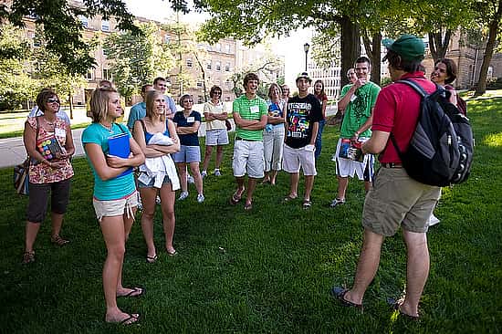 A New Student Leader tour guide leads incoming first-year undergraduates and their parents across Bascom Hill while on a campus tour during a Student Orientation, Advising and Registration (SOAR) session at the University of Wisconsin-Madison on July 22, 2008. Sponsored by Orientation and New Student Programs, the two-day SOAR sessions provide new students and their parents an opportunity to meet with staff and advisors, register for classes, stay in a residence hall, take a campus tour and learn about campus resources. ©UW-Madison University Communications 608/262-0067 Photo by: Jeff Miller Date:  07/08    File#:  NIKON D3 digital frame 6148