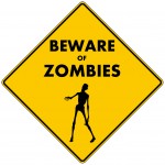 Beware of Zombies: a caution road sign warning you to beware of zombies in the immediate area, pictured with a zombie reaching out. Isolated.