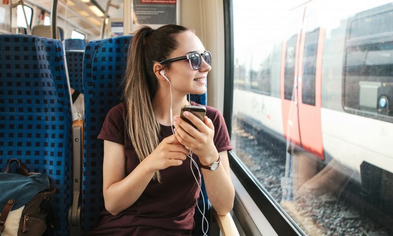 7 Podcasts to Listen to On Your Next Trip