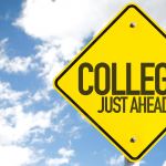 College Just Ahead sign with sky background