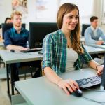 High school students prepare to take the digital SAT on school computers