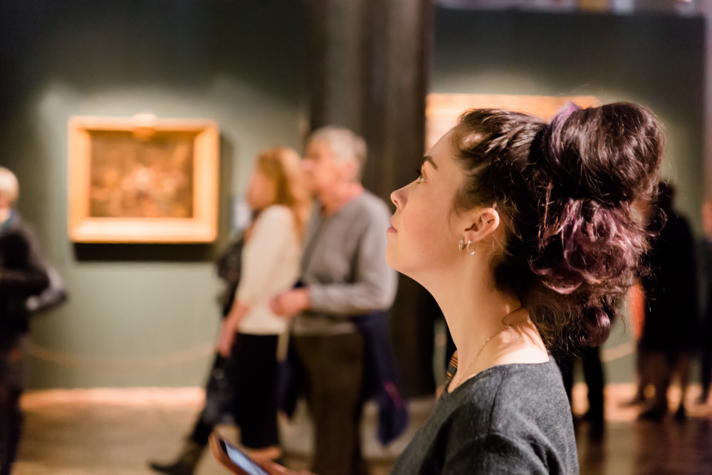 Young woman at an art museum during Maymester. Excursion with group.