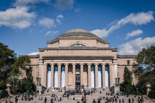 students on the steps of the library at Columbia University