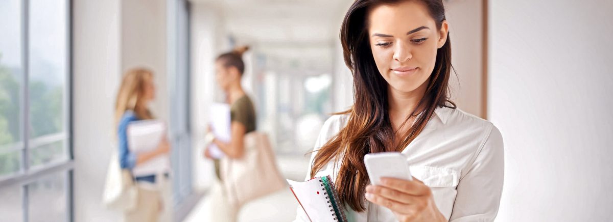 High school senior checks for college admissions decisions.