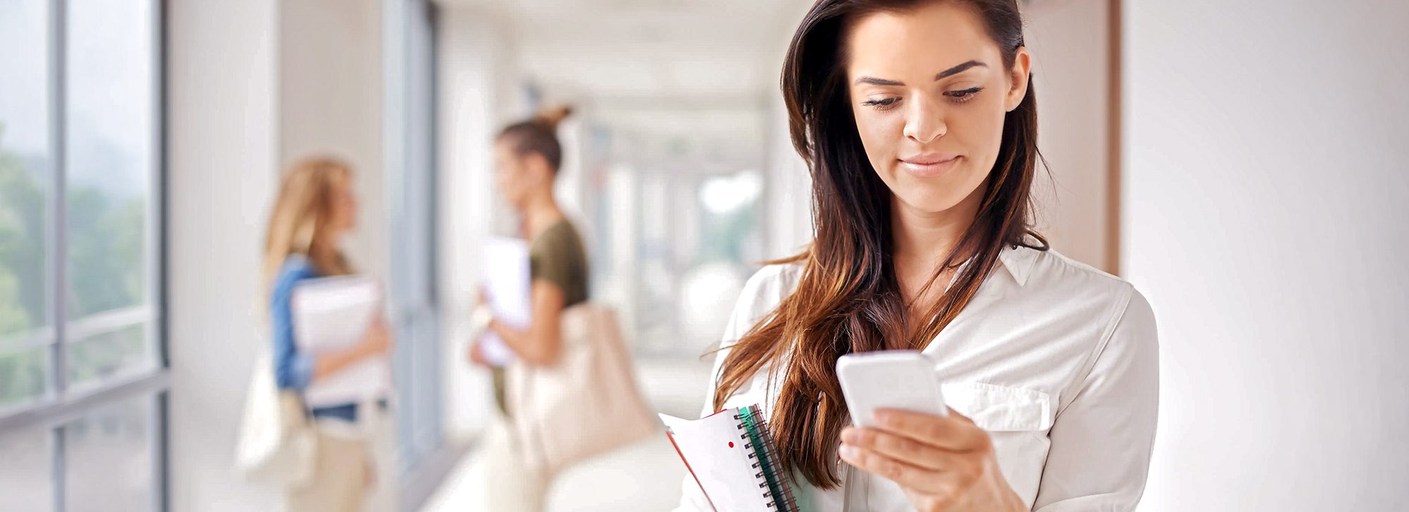 High school senior checks for college admissions decisions.