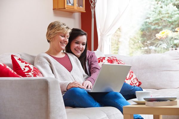 Mother and daughter on laptop